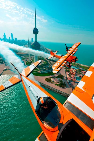 UAE Innovative Advertising Agency Orange Plane Flyover Ad